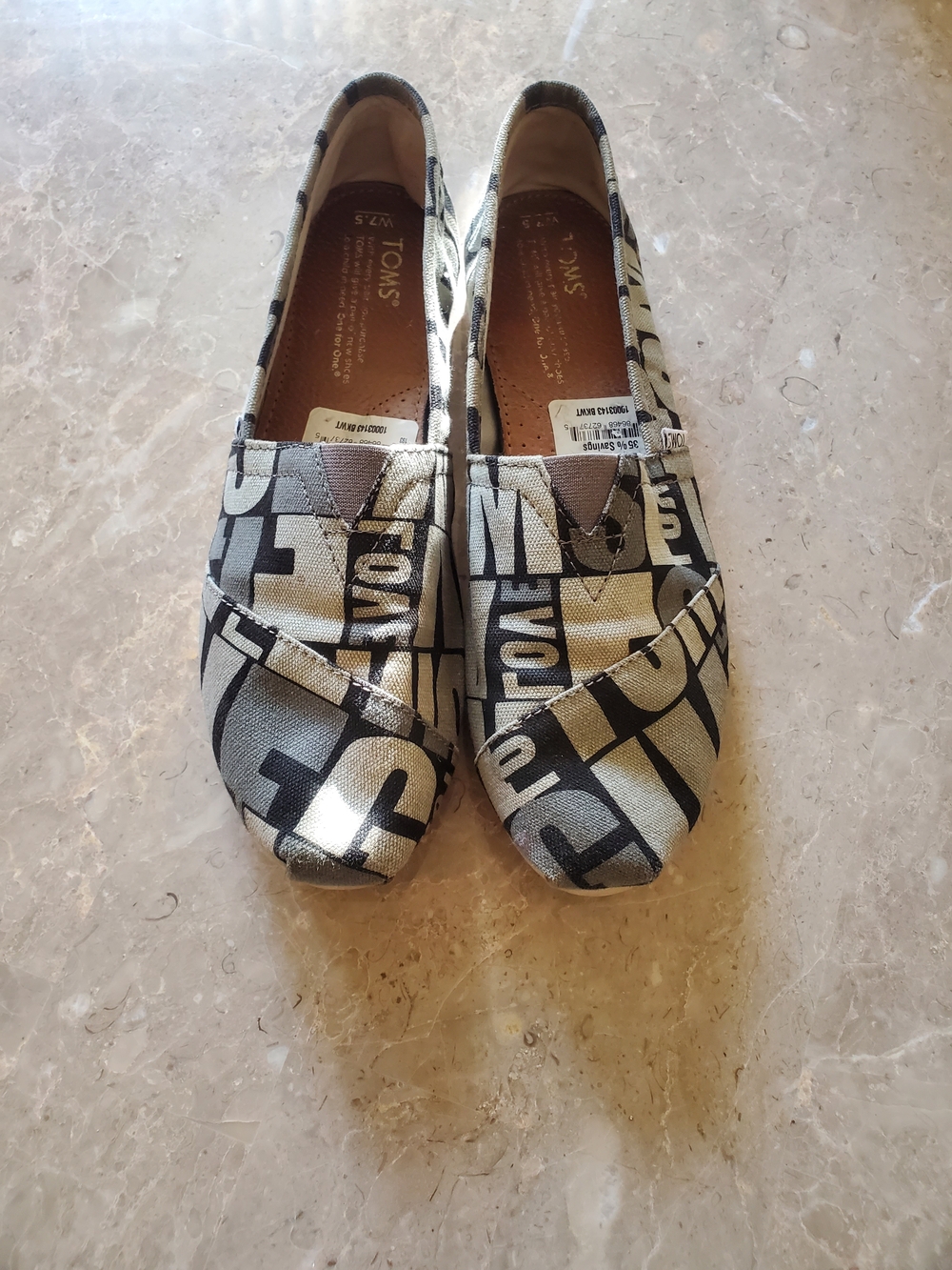 Toms Black and White Logo Canvas Slip-On Flats